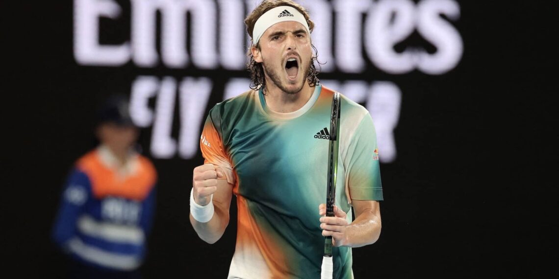 Greece's Stefanos Tsitsipas reacts as he wins a set against Taylor Fritz of the US during their men's singles match on day eight of the Australian Open tennis tournament in Melbourne on January 24, 2022. - -- IMAGE RESTRICTED TO EDITORIAL USE - STRICTLY NO COMMERCIAL USE -- (Photo by Martin KEEP / AFP) / -- IMAGE RESTRICTED TO EDITORIAL USE - STRICTLY NO COMMERCIAL USE -- (Photo by MARTIN KEEP/AFP via Getty Images)