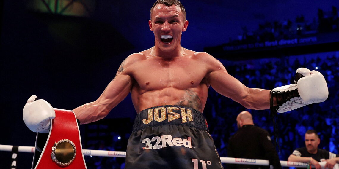 Boxing - Kiko Martinez v Josh Warrington - IBF Featherweight World Title - First Direct Arena, Leeds, Britain - March 26, 2022  Josh Warrington celebrates with the belt after winning the fight against Kiko Martinez Action Images via Reuters/Lee Smith     TPX IMAGES OF THE DAY