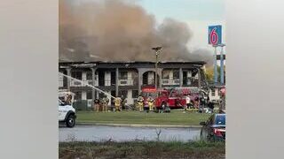 Banks County firefighters can be seen battling a blaze at the Motel 6 in Commerce on June 20, 2022. (Derek Lee / FOX 5 viewer)