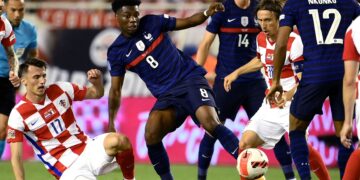 France's midfielder Aurelien Tchouameni (C) fights for the ball with Croatia's forward Ante Budimir (L) and Croatia's midfielder Luka Modric (R) during the UEFA Nations League - League A Group 1 football match between Croatia and France at Stadion Poljud in Split, on June 6, 2022. (Photo by FRANCK FIFE / AFP) (Photo by FRANCK FIFE/AFP via Getty Images)