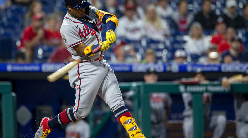 Atlanta Braves' Ronald Acuna Jr. hits a home run during the third inning of a baseball game against the Philadelphia Phillies, Tuesday, June 8, 2021, in Philadelphia. (AP Photo/Laurence Kesterson)