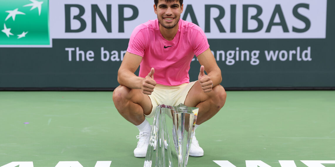 INDIAN WELLS, CALIFORNIA - MARCH 19: Carlos Alcaraz of Spain with the winners trophy after defeating Daniil Medvedev in the final during the BNP Paribas Open on March 19, 2023 in Indian Wells, California. (Photo by Julian Finney/Getty Images)