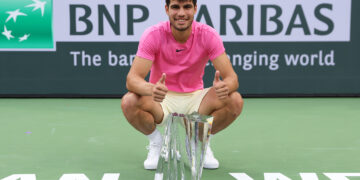 INDIAN WELLS, CALIFORNIA - MARCH 19: Carlos Alcaraz of Spain with the winners trophy after defeating Daniil Medvedev in the final during the BNP Paribas Open on March 19, 2023 in Indian Wells, California. (Photo by Julian Finney/Getty Images)