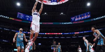 Washington Wizards guard Johnny Davis (1) shoots against the Detroit Pistons during the first half of an NBA basketball game Tuesday, March 14, 2023, in Washington. (AP Photo/Carolyn Kaster)