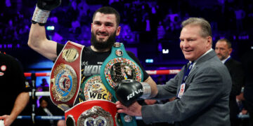 LONDON, ENGLAND - JANUARY 28: Artur Beterbiev celebrates with their Title Belts after defeating Anthony Yarde ( not pictured ) during the IBF, WBC, WBO World Light Heavyweight Title fight between Artur Beterbiev and Anthony Yarde at OVO Arena Wembley on January 28, 2023 in London, England. (Photo by James Chance/Getty Images)