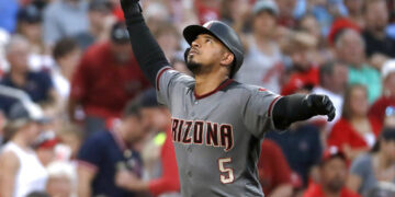 Arizona Diamondbacks' Eduardo Escobar looks skyward as he rounds the bases after hitting a solo home run during the fifth inning of the team's baseball game against the St. Louis Cardinals on Saturday, July 13, 2019, in St. Louis. (AP Photo/Jeff Roberson)