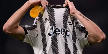 Juventus' Italian midfielder Nicolo Fagioli takes off his jersey at the end of the UEFA Europa League round of 16 first leg football match between Juventus and SC Freiburg on March 9, 2023 at the Juventus stadium in Turin. (Photo by Marco BERTORELLO / AFP) (Photo by MARCO BERTORELLO/AFP via Getty Images)