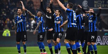-- Inter Milan's team celebrates at the end of the Italian Serie A football match Inter Milan vs AC Milan on February 9, 2020 at the San Siro stadium in Milan. / AFP / MARCO BERTORELLO