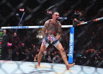 LAS VEGAS, NEVADA - APRIL 13: Max Holloway reacts to the knockout of Justin Gaethje in the BMF championship fight during the UFC 300 event at T-Mobile Arena on April 13, 2024 in Las Vegas, Nevada. (Photo by Chris Unger/Zuffa LLC via Getty Images)