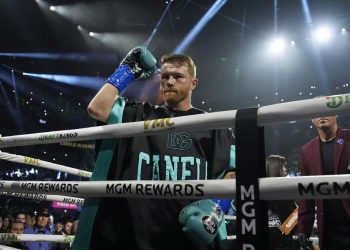 Canelo Alvarez motions from the ring before fighting Jaime Munguia in a super middleweight title fight Saturday, May 4, 2024, in Las Vegas. (AP Photo/John Locher)